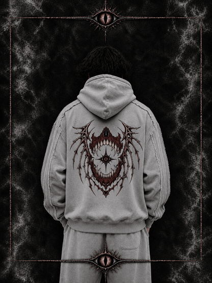 Light gray WINGED CRIMSON WITNESS HOODIE showing cropped oversized fit and front print