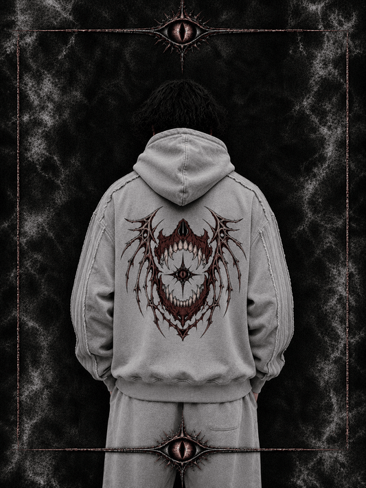 Light gray WINGED CRIMSON WITNESS HOODIE showing cropped oversized fit and front print